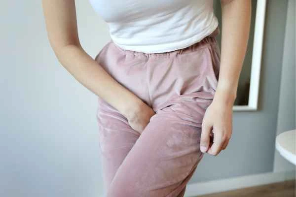 woman running for the toilet because of urinary incontinence Southend